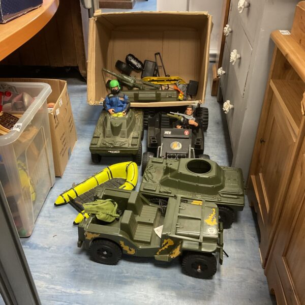 Vintage Action Man vehicle lot with jeep and tracked vehicle.