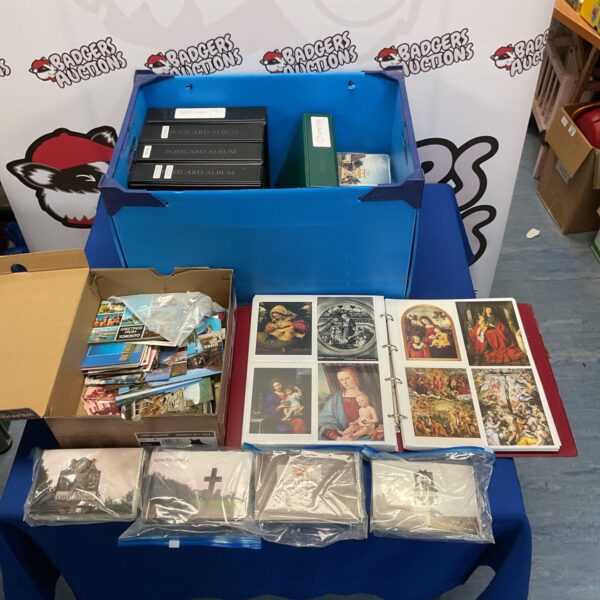 Large collection of vintage postcards in albums, ideal for collectors.