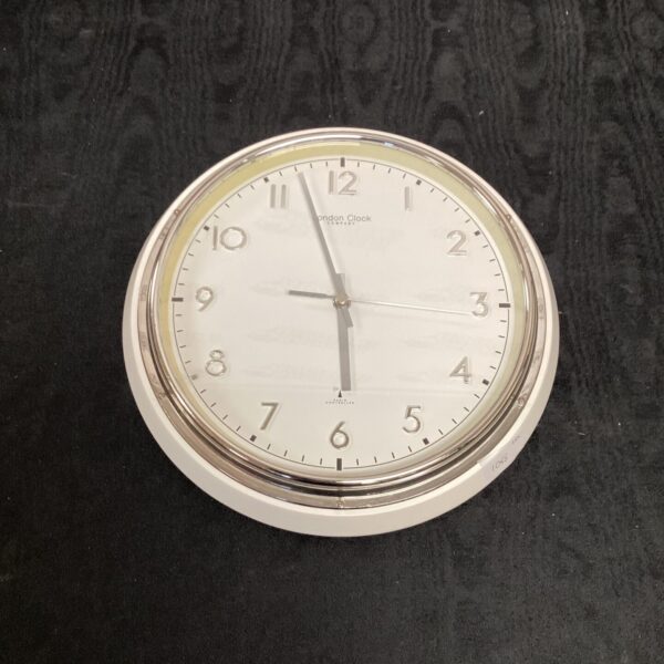 Modern London Clock Company radio controlled wall clock for accurate timekeeping.