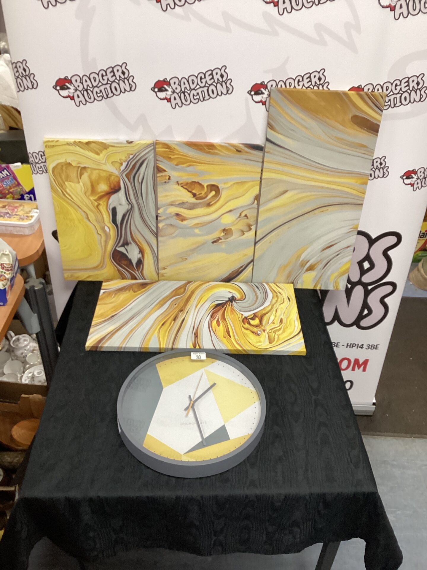 252 Modern yellow swirl patterned art workwith Churchgate Wall Clock