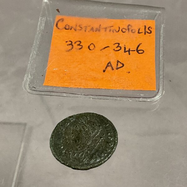 Ancient bronze Roman coin from Constantinopolis, 330-346 AD.