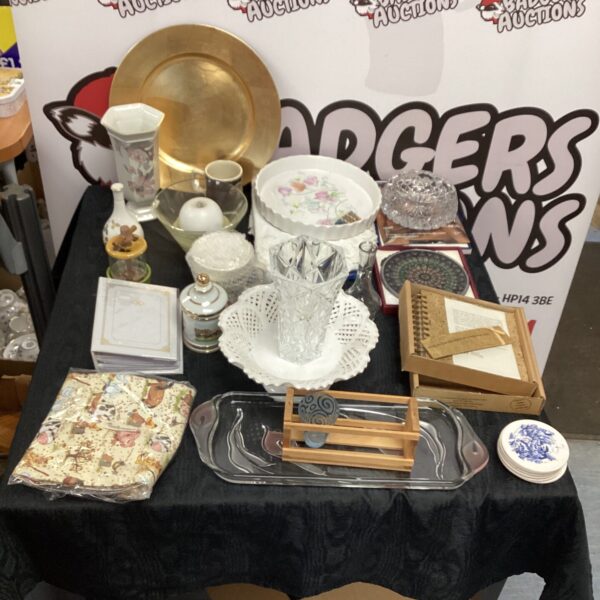 Mixed lot of vintage collectibles including a crystal vase and figurines.