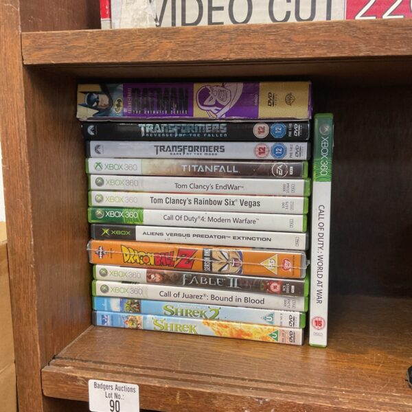 Xbox 360 games and DVD bundle for collectors and gamers.