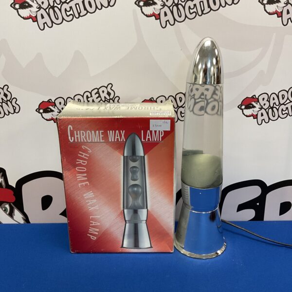 Vintage chrome lava lamp with wax globules, retro 1970s style.