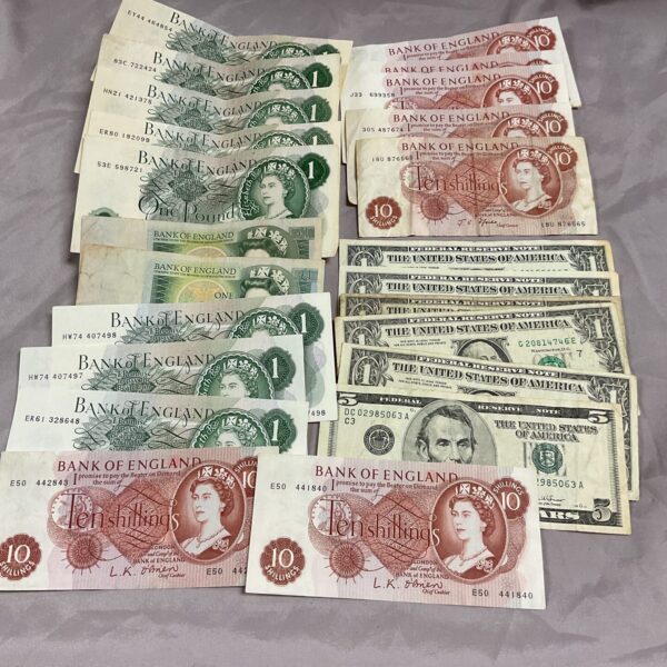 Collection of vintage British and American banknotes for collectors.