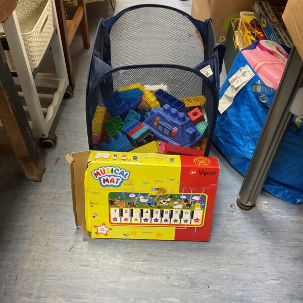 Colourful Mega Blocks and musical play mat for toddlers.