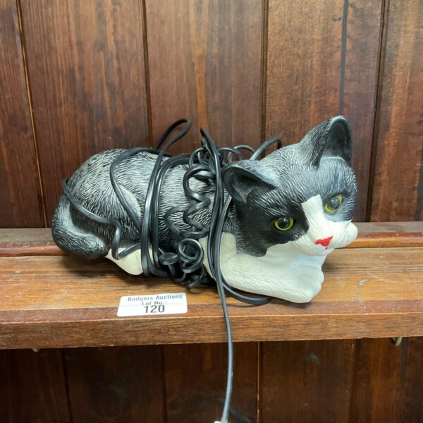 Vintage novelty cat telephone, a unique collectible desk phone.