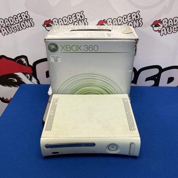 Boxed Microsoft Xbox 360 E gaming console for retro gaming.