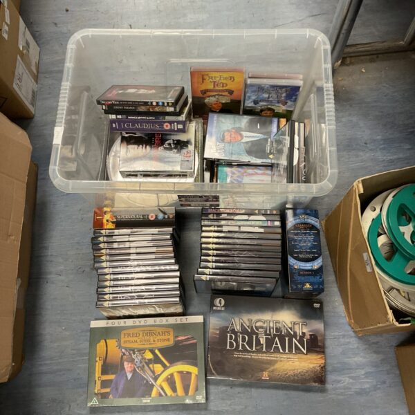 Large lot of DVDs including Stargate SG1 and Prison Break.