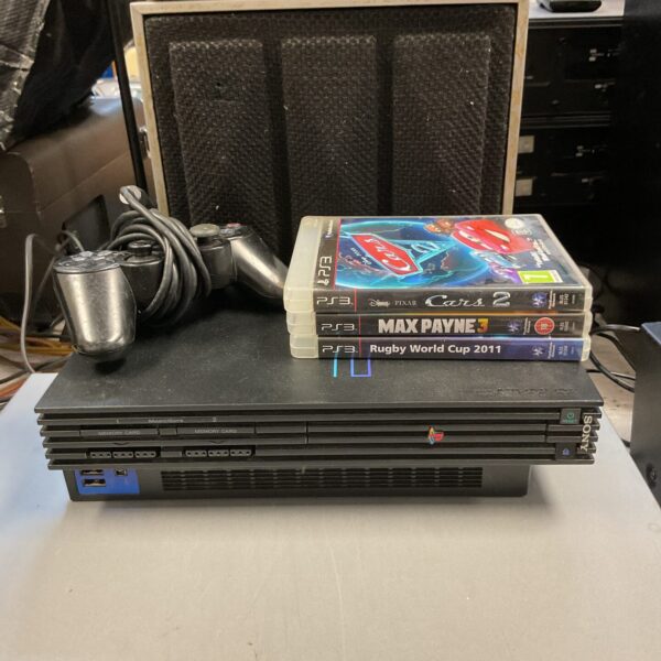 Sony PS2 console bundle with controller and PS3 games.