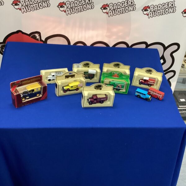 Vintage diecast car collection in original boxes.