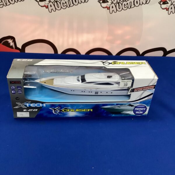Vintage X-Tech Xx Cruiser boat in its original box.