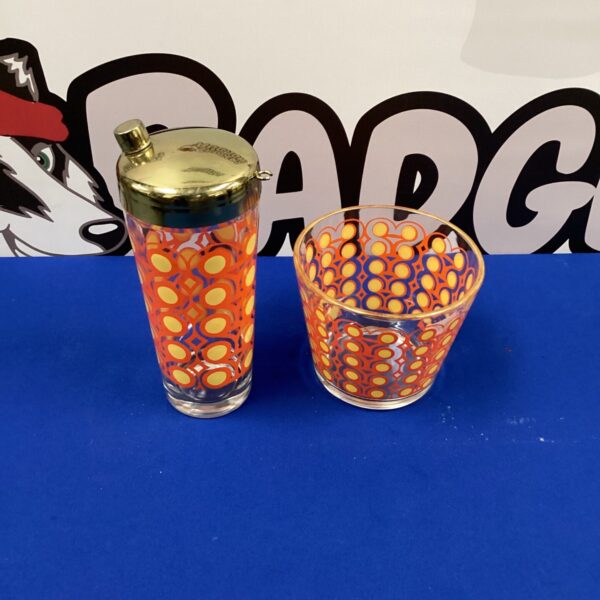 Vintage Colony Frolic cocktail shaker with orange geometric design.