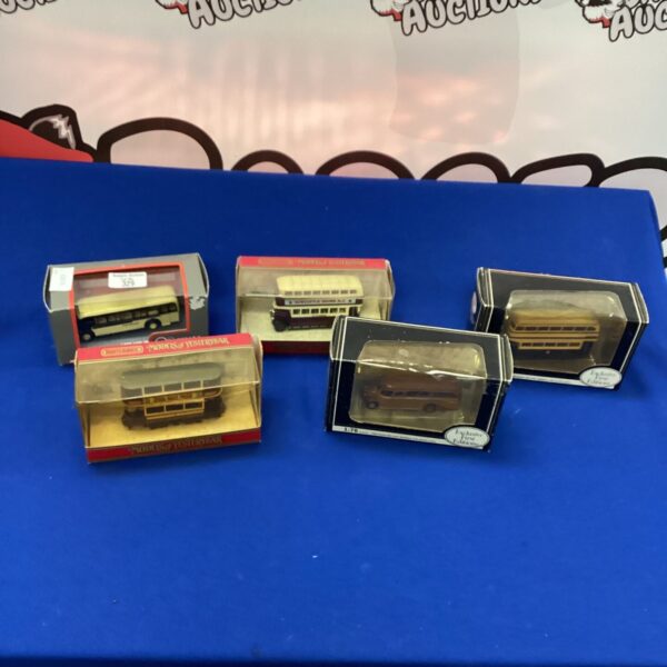 Vintage diecast model cars in original boxes, collectible toy cars.