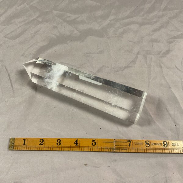 Large clear quartz crystal specimen for display or collection.