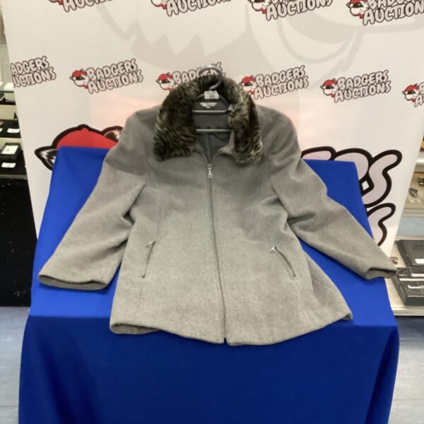 Grey ladies Kloss coat size 14 with fur trim.