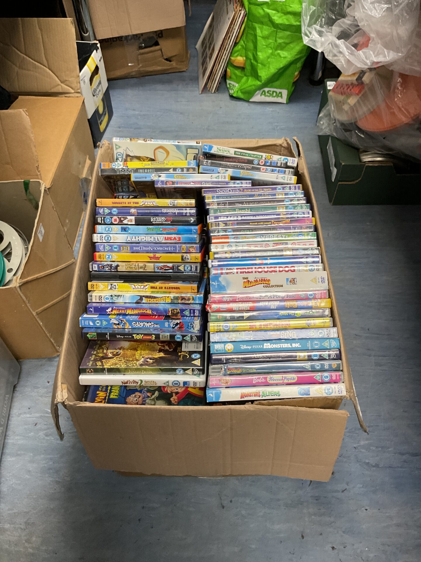 147 Large box of mostly childrens dvds inc disney
