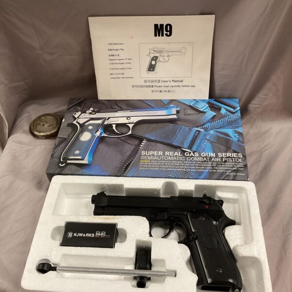 M9 gas blowback pistol replica, metal and polymer construction, no magazine.