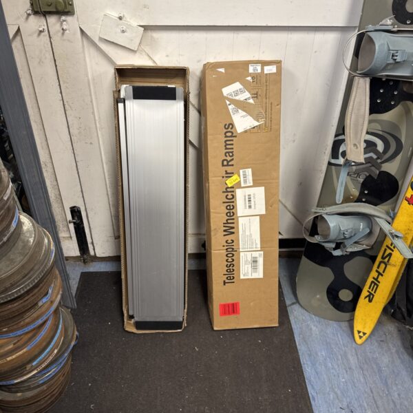 Set of telescopic wheelchair ramps for portable accessibility.