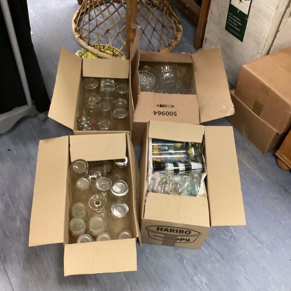 Mixed lot of drinking glasses including Fosters branded glassware.