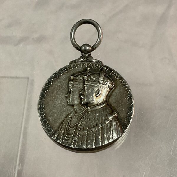 Silver jubilee medal featuring King George V and Queen Mary.