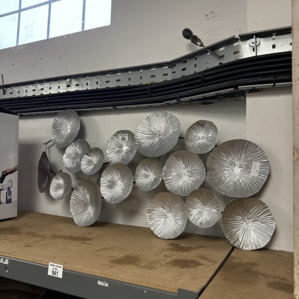 Abstract metal wall art sculpture for modern decor.