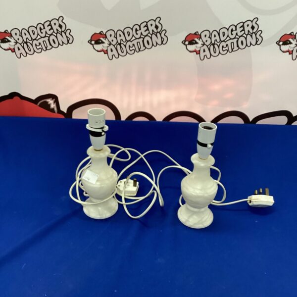 Pair of vintage marble table lamps with cream shades.