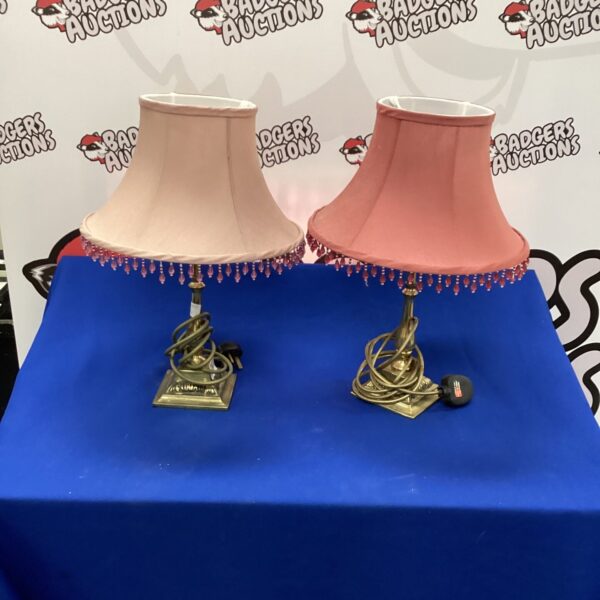 Pair of vintage brass candlestick table lamps with shades.