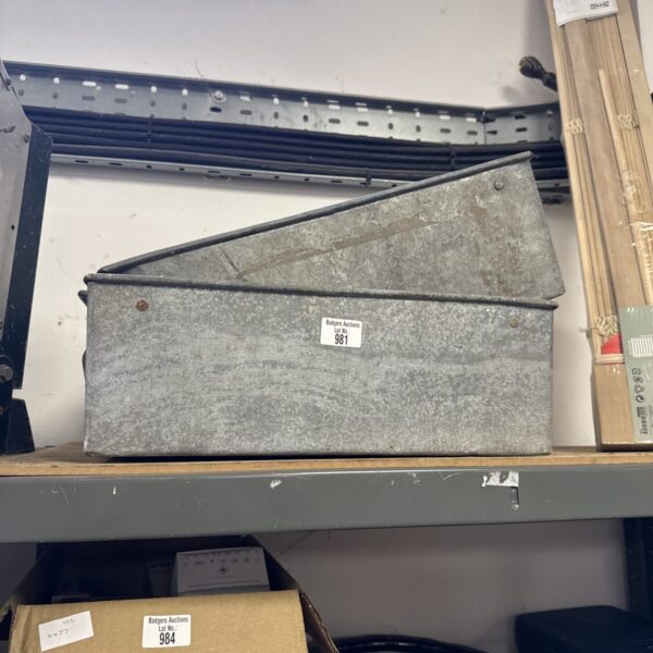 Two vintage galvanised steel tote trays for garden or farm use.