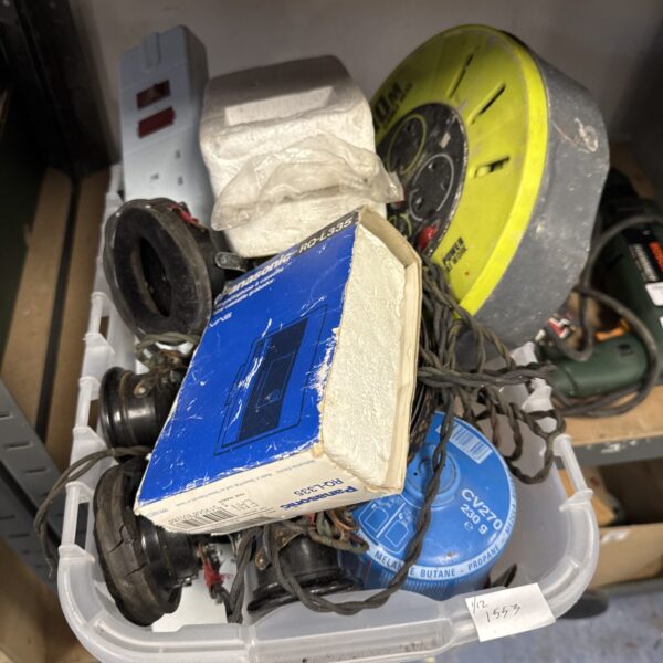 Shed clearance lot with extension reel and assorted garden tools.