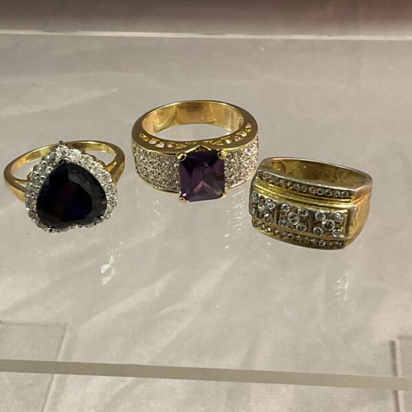 Silver gilt ring with a cluster of coloured stones.