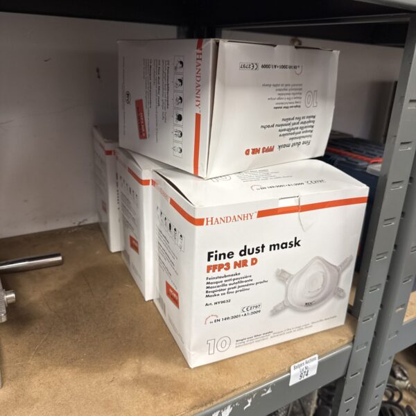 Sealed boxes of Handan FFP3 fine dust masks for respiratory protection.