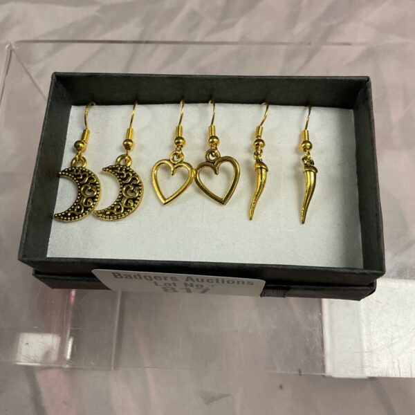 Silver gilt crescent moon earrings, delicate fashion jewellery.