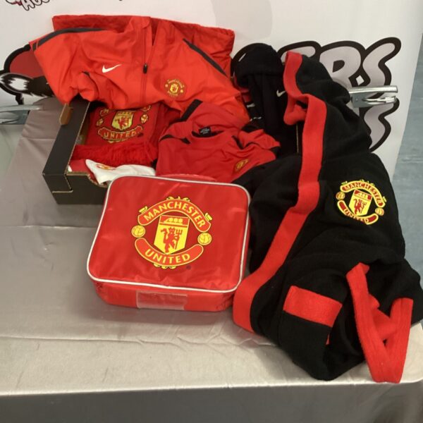 Tray of mixed Man United child clothing and accessories.