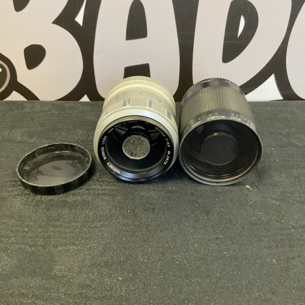 Vintage 500mm mirror lens with front element visible.