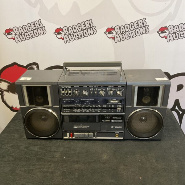 Vintage Hitachi ghettoblaster portable stereo radio with antenna.