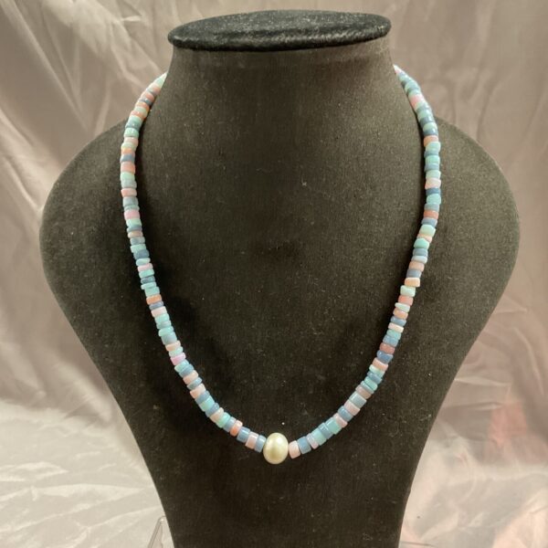 Pastel pink and blue beaded necklace with Peruvian pearl focal point.