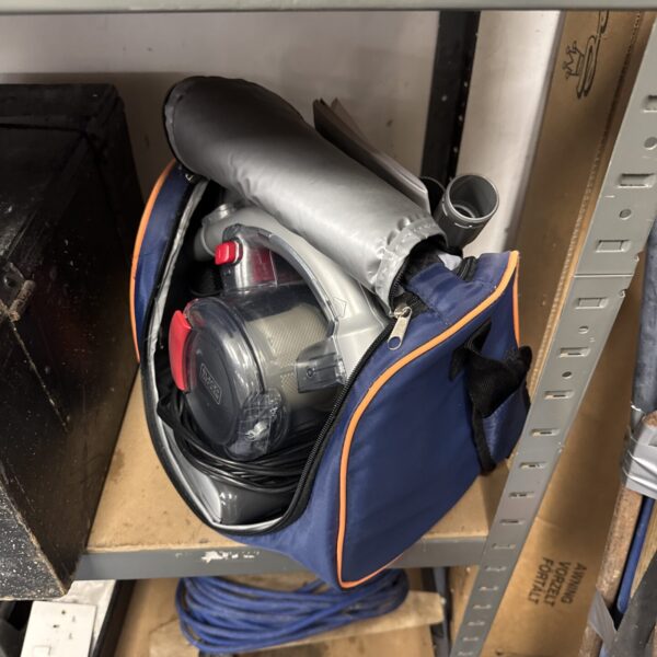 Black and Decker 12V car hoover with carry case and attachments.