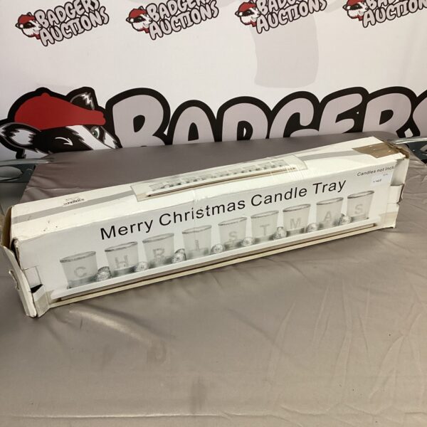 Vintage Merry Christmas candle tray with festive design.