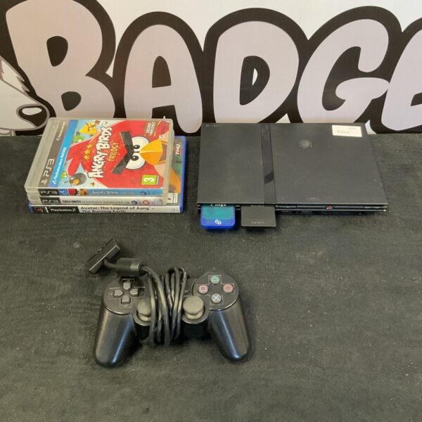 Sony PlayStation 2 console with controller and games bundle.