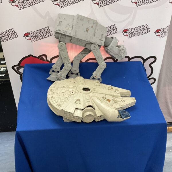 Vintage Star Wars toy lot featuring Millennium Falcon and AT-AT Walker.