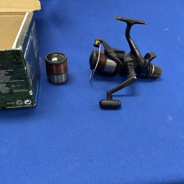 Vintage Shimano Britrunner 5000 fishing reel with two spools.