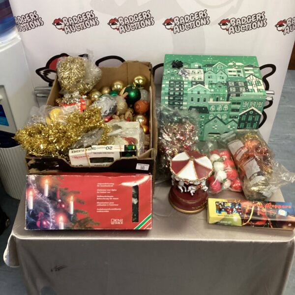Assorted Christmas decorations bundle with lights, tinsel and baubles.