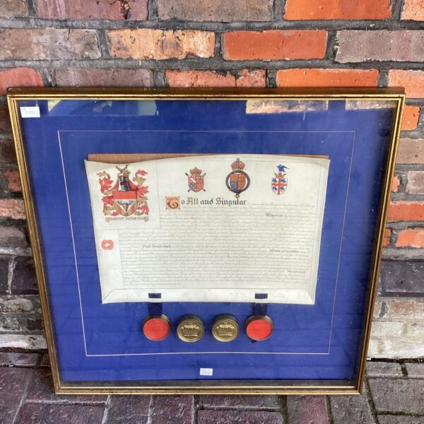Antique indenture document with wax seals, a historical legal paper.