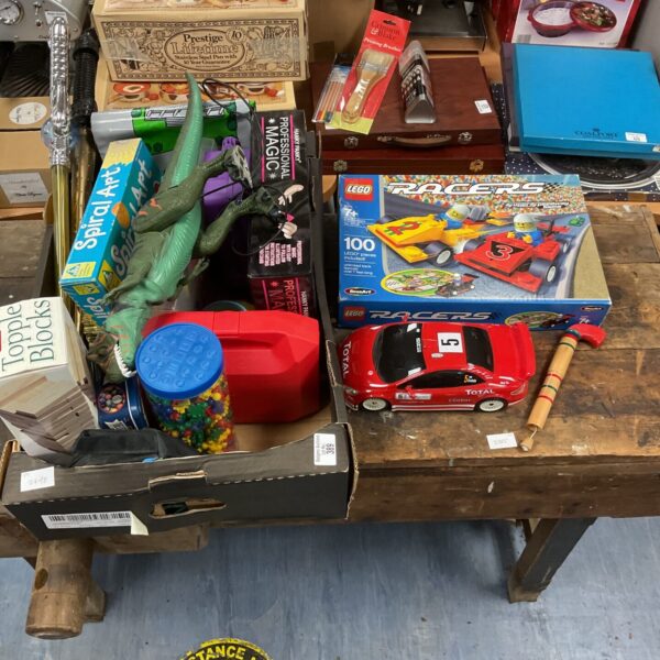 Overview of a mixed toy lot including Lego and RC car.