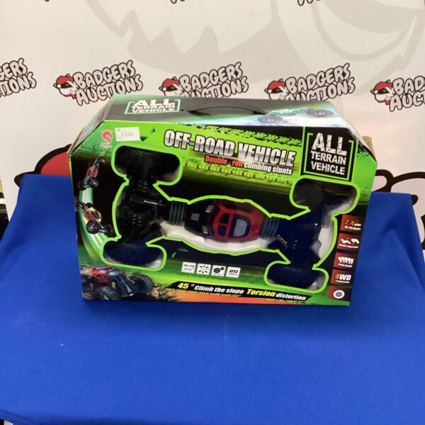 Remote control all terrain vehicle in original box, model 2520.