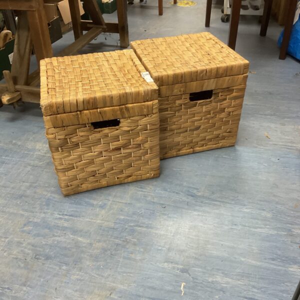 Pair of woven ballrush storage boxes for home organisation.