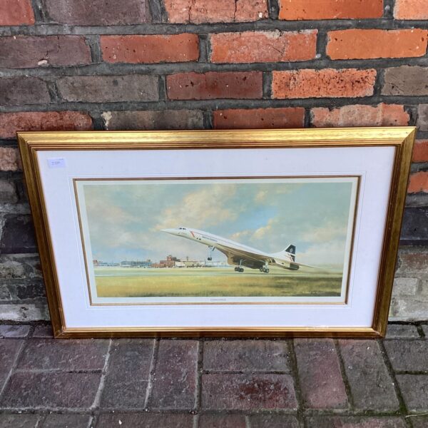 Framed Terry Harrison print of a British Airways Concorde aircraft.