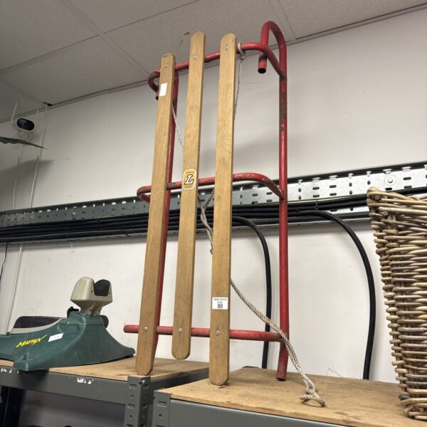 Vintage Lew Ways Ltd show sled with wooden construction.