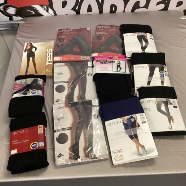 Assorted black tights and leggings in a mixed size lot.